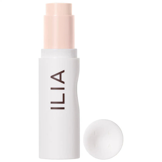 Ilia Skin Rewind Blurring Foundation and Concealer Complexion Stick in various shades, new in box, with sleek packaging and product details.