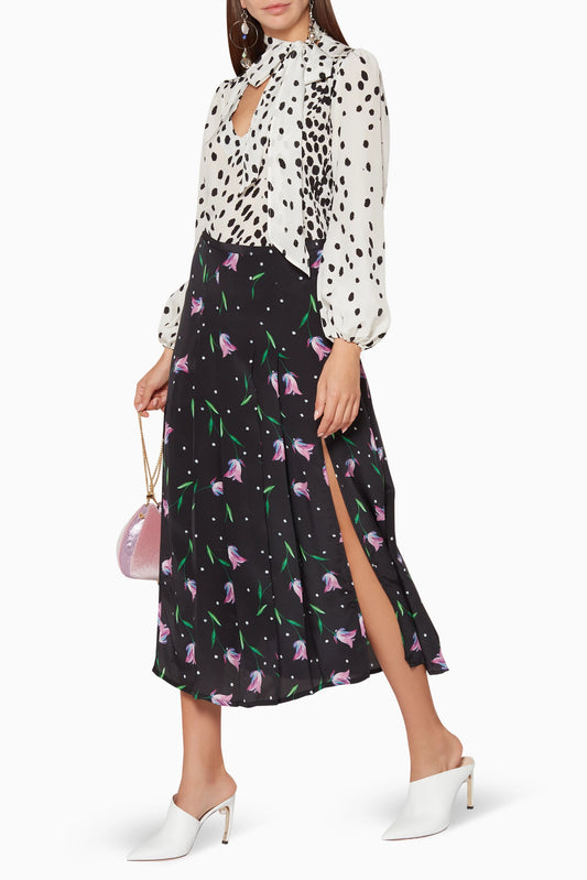 Rixo Georgia silk skirt in size small featuring a flowy design and elegant pattern, perfect for stylish women's clothing.