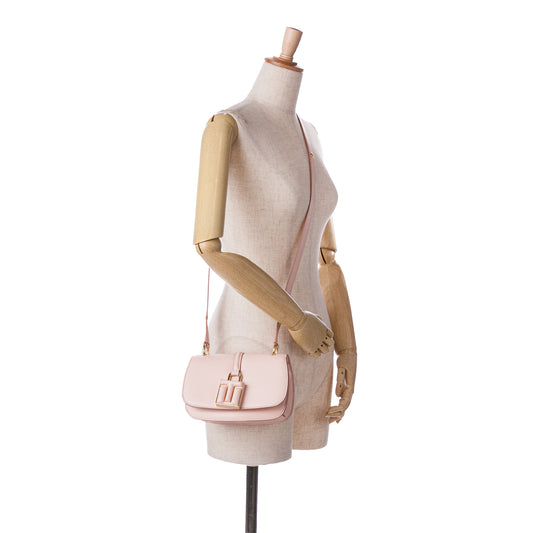 Pink Tom Ford calfskin Lock crossbody bag with sleek design and adjustable strap, perfect for stylish everyday use.