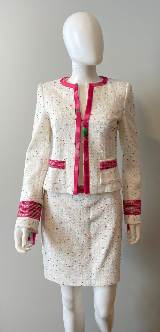 Escada skirt suit in size 4, tailored clothing with a fitted blazer and matching skirt, elegant professional attire.