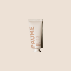 PAUME Probiotic Hand Balm in a sleek container, showing the luxurious beauty product designed for nourishing and hydrating hands.