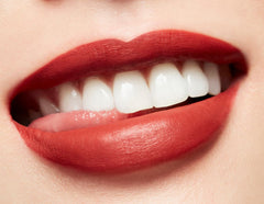MAC M.A.C Retro Matte Liquid Lipcolour in 135 Chili Addict, vibrant red liquid lipstick in sleek tube.