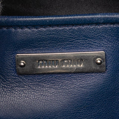 Blue Miu Miu Matelasse Nappa Crystal Satchel bag with quilted design and silver hardware, stylish and luxurious accessory.