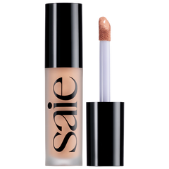 Saie Slip Tint Radiant All-Over Concealer in multiple shades, new in box, with swatches showing various skin tone options.
