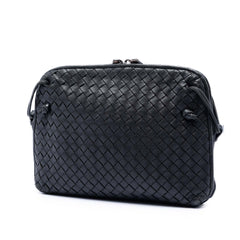 Black Bottega Veneta Nappa Intrecciato Nodini crossbody bag with woven leather design, showcasing the signature craftsmanship.