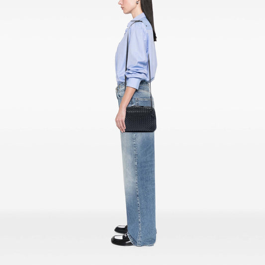 Black Bottega Veneta Nappa Intrecciato Nodini crossbody bag with woven leather design and sleek strap.