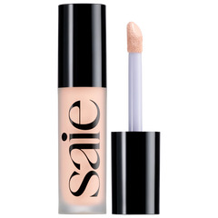 Saie Slip Tint Radiant All-Over Concealer in various shades, showing a sleek tube with a natural, radiant finish for flawless skin.