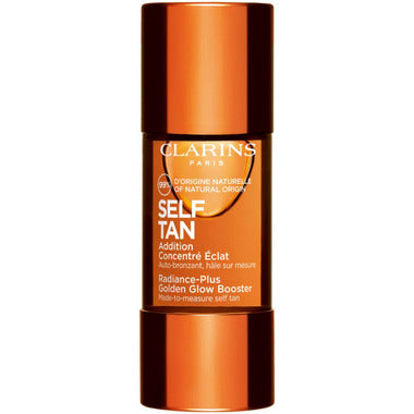 Clarins Radiance-Plus Golden Glow Booster 30ml beauty product bottle with gold accents for radiant skin enhancement