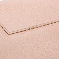 Tom Ford Medium Leather Natalia Crossbody Bag in pink, featuring sleek design and adjustable strap, on white background.