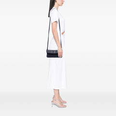 Black Bottega Veneta Mini Nappa Intrecciato crossbody bag with turn lock closure, showcasing woven leather design and compact style.