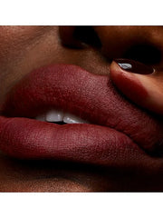 M.A.C Powder Kiss Lipstick in various shades, new in box, showcasing vibrant color and sleek packaging for a beauty product.