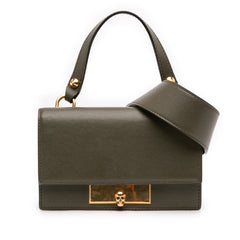 Alexander McQueen mini leather skull lock top handle bag in vibrant green with gold hardware and structured design.