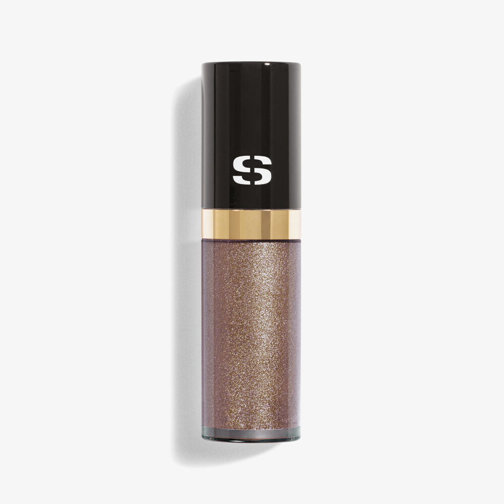Sisley Ombre Eclat Liquide Stardust NIB liquid eyeshadow in a shimmering shade, displayed on a neutral background.