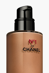 Chanel N°1 de Chanel Skin Enhancer Intense Amber in 30ml bottle, featuring sleek packaging and product details.