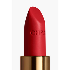 Chanel Rouge Allure Velvet lipstick in various shades, new in box, showcasing luxurious beauty product with sleek packaging.