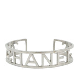 Chanel Silver Plated Cutout Logo Cuff Bracelet