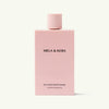Mela & Kera Balayage Exceptionnel Shampoo 250ml bottle with sleek black and gold packaging