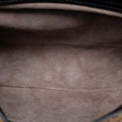 Bottega Veneta pony hair leopard print shoulder bag with sleek design and textured animal print.