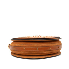 Chloé Small Suede and Raffia Pixie Satchel bag with woven details and sleek design, featuring a compact shape and top handle.
