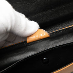 Black Celine leather carriage clutch bag with sleek design and structured shape, perfect for elegant occasions.
