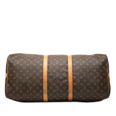 Louis Vuitton Monogram Keepall Bandouliere 60 brown travel bag with leather handles and adjustable strap, classic Louis Vuitton design.