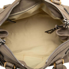 Chloé Medium Leather Paddington handbag with top handles and structured design, showcasing its smooth leather finish.