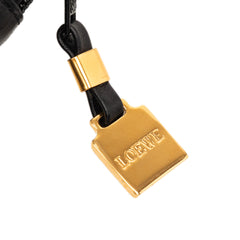 Black LOEWE leather Anagram clutch bag with sleek design and textured finish, perfect for elegant evening accessories.