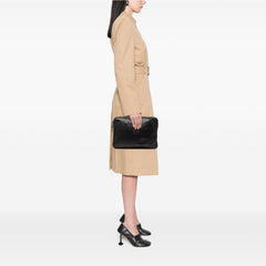 Black LOEWE leather Anagram clutch bag with sleek design and detailed logo accents.