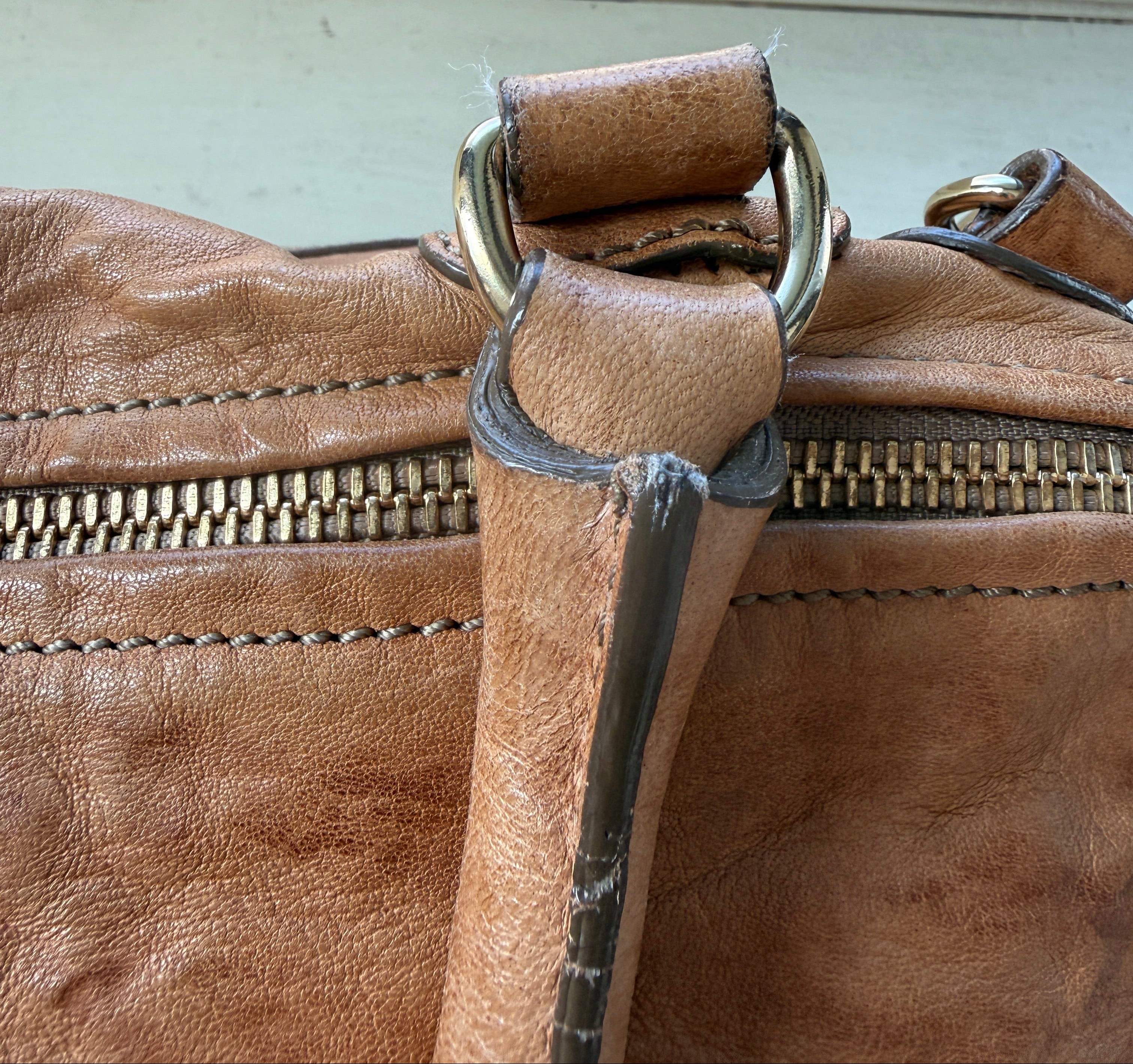 Givenchy Large Pepe Tan Pandora bag featuring sleek design and spacious interior, perfect for stylish everyday use.