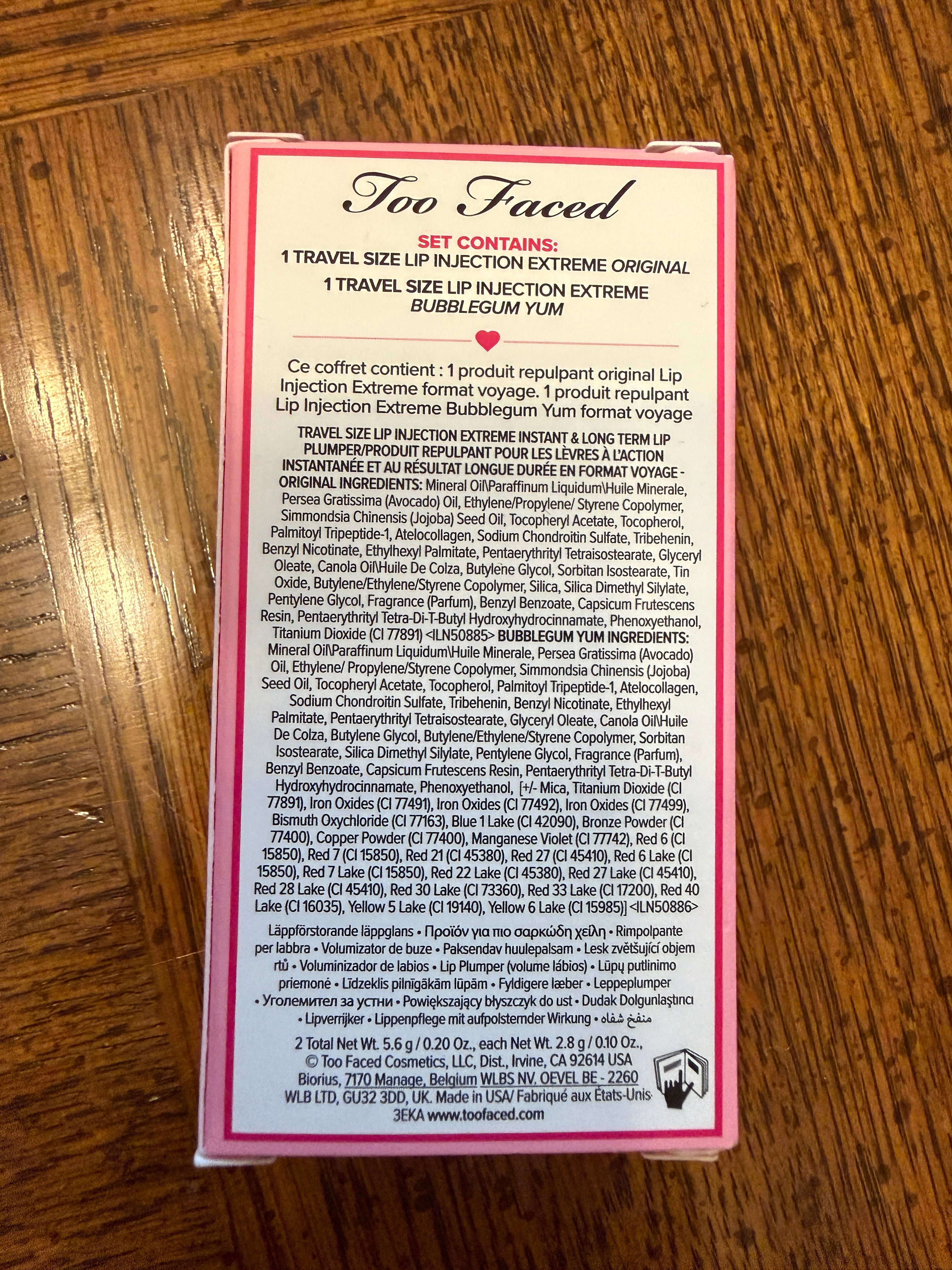 Too Faced Lip Injection Plump & Pretty Set, unopened beauty kit with lip plumping gloss and matching lip products on a white background.