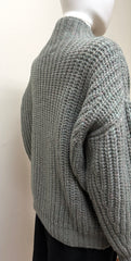Isabel Marant Iris sweater featuring a cozy knit design, crew neckline, and relaxed fit in a neutral color.