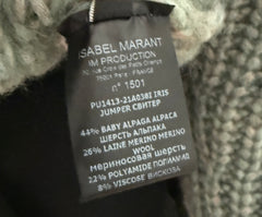 Isabel Marant Iris sweater in soft knit, featuring a relaxed fit with ribbed cuffs and neckline, styled in neutral tones.