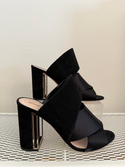 Black Nicholas Kirkwood Nini mules in size 38, featuring sleek design and pointed toe, on a neutral background.