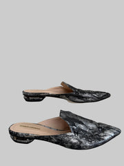 Silver Nicholas Kirkwood flat mule shoes, size 38, with sleek design and pointed toe, displayed on neutral background.