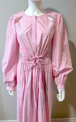 Pink Dorothee Schumacher dress with cutouts, size 2, stylish women's clothing featuring a fitted silhouette and fashion-forward design.