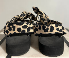 Loeffler Randall animal print sandals in size 7.5 with open toe design and stylish patterned straps.