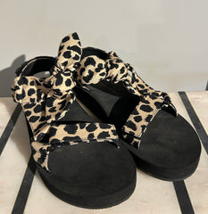 Loeffler Randall animal print sandals in size 7.5, featuring stylish slip-on design and bold animal pattern on a comfortable shoe.