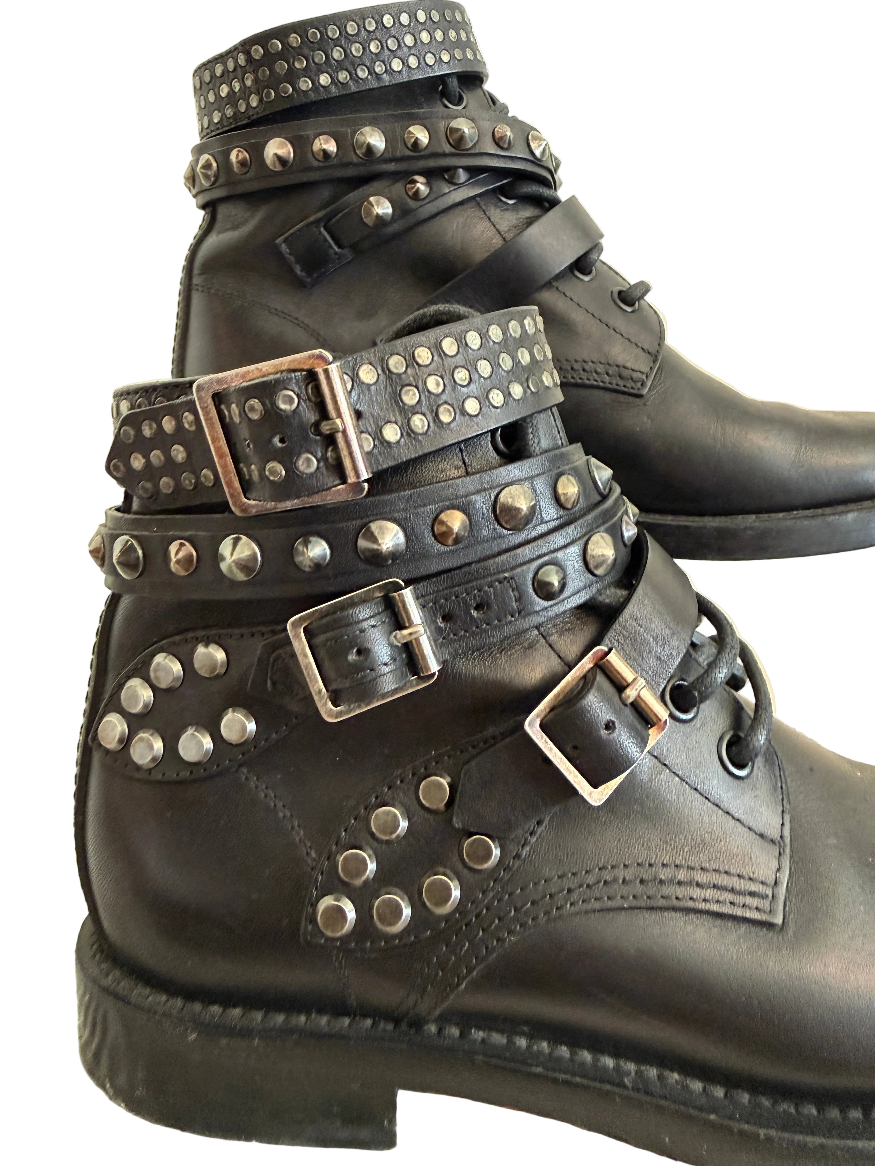 Yves Saint Laurent Ranger Stud Boot with wrap straps in size 37.5, showcasing black leather boots with studded accents.