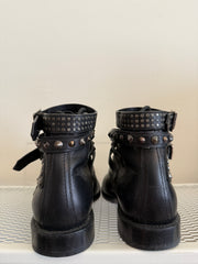 Yves Saint Laurent Ranger Stud Boot with wrap straps in size 37.5, featuring black leather and gold-tone stud details.