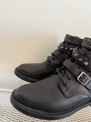 Yves Saint Laurent Ranger Stud Boot in size 37.5 with wrap straps, featuring stud details and sleek black leather design.