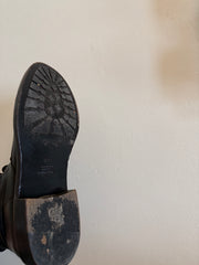 Valentino Rock Stud Combat Boots size 38.5 with black leather and signature stud embellishments, front view.