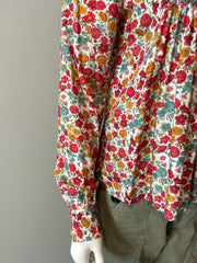 Loretta Caponi floral blouse in size small, featuring a delicate floral pattern and lightweight fabric, perfect for casual or dressy wear.