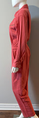 Xirena Jaymes cotton pink jumpsuit in size small, featuring a relaxed fit and sleeveless design, worn by a model.