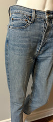 Re/Done Originals classic stone wash button fly jeans in size 27, featuring a denim fabric with metal buttons and a vintage look.