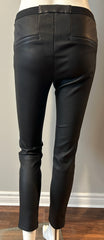 Helmut Lang lamb leather pants in size 2, black, with a sleek fit and modern design, displayed on a hanger.