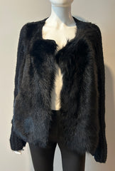 Of Two Minds reversible jacket in size medium, showcasing both sides with a stylish, casual design.
