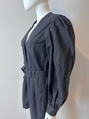 Black denim romper by Ulla Johnson, size 2, featuring a stylish, relaxed fit with long sleeves and a button-front design.