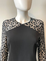 Stella McCartney mini dress in size IT44/US6, stylish clothing with a sleek, modern design, shown on a hanger.
