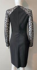 Stella McCartney mini dress in size IT44/US6, stylish clothing with a sleek design, shown on a model.