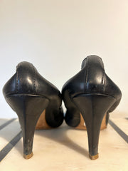 Lanvin leather pumps in size 8.5, stylish women's shoes with sleek design and pointed toe, perfect for elegant occasions.